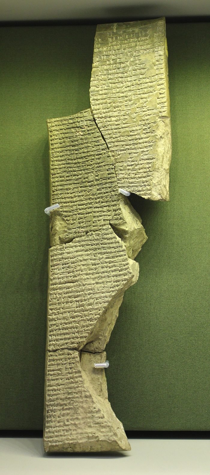 The poem’s own clay: a fragment of the First Tablet from the library of Ashurbanipal at Nineveh, 7th century BC (British Museum K.3473). The lines on this card were pressed into tablets like this one with a cut reed.
