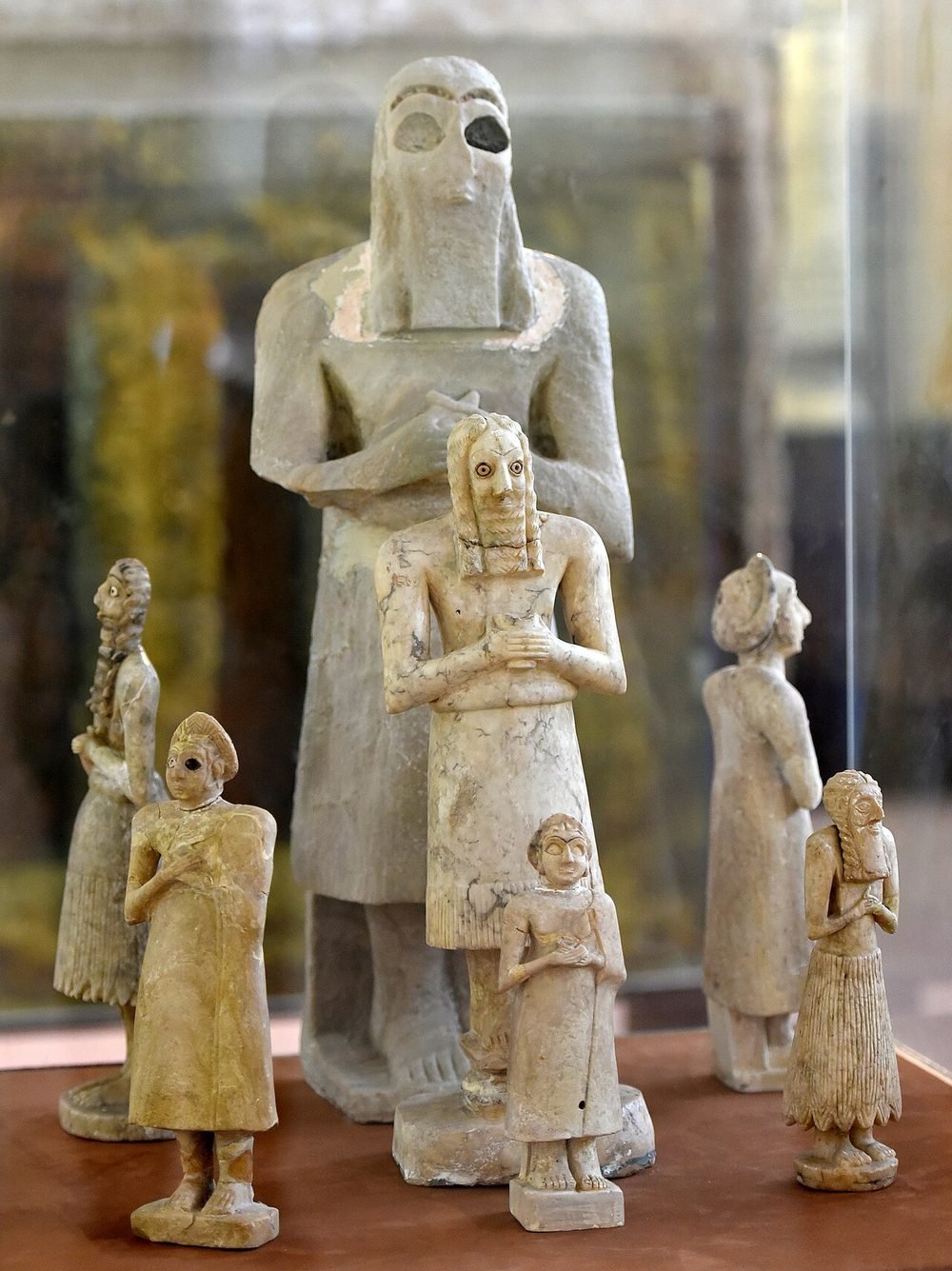 Made to serve the gods: stone worshippers from the temples of Eshnunna and Tutub in the Diyala valley, about 2900-2550 BC, now in the Iraq Museum, Baghdad. Each stands with hands clasped, eyes wide, set in front of a god to pray for its owner without end.