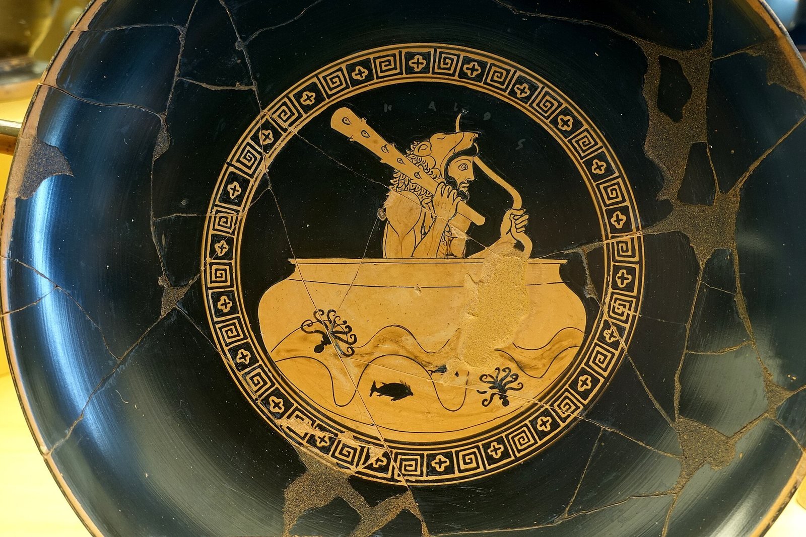 Athenian red-figure cup, about 480 BC, in the manner of Douris. Herakles, with his club and his bow, sails across the Ocean in the golden cup that the Sun lent him for his journey to the far west.