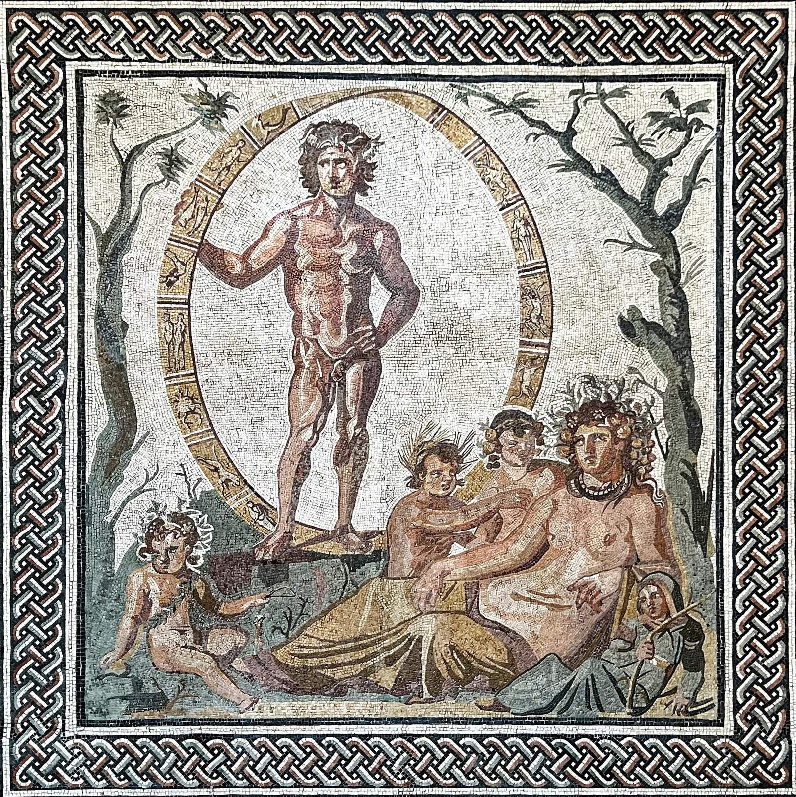 Roman floor mosaic from a villa at Sentinum in Italy, about AD 200 to 250. The Earth goddess, Tellus to the Romans, reclines with four small children, usually taken as the Seasons, while Aion, god of eternity, stands inside the turning ring of the zodiac.