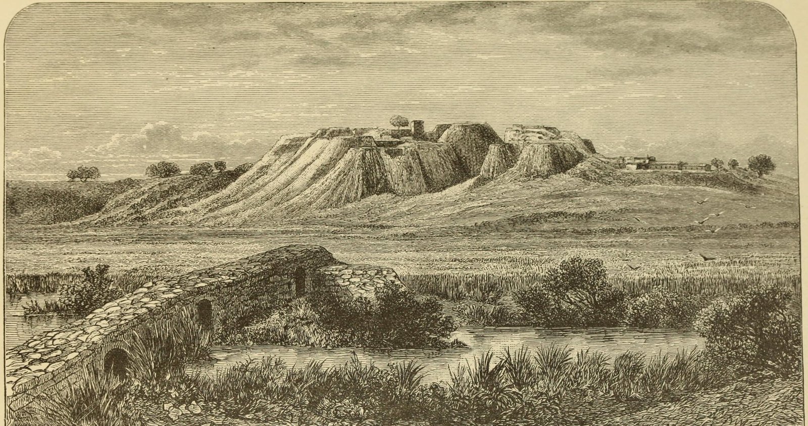 The mound of Troy at Hisarlık after the excavations of 1879, seen from a bridge on the Scamander